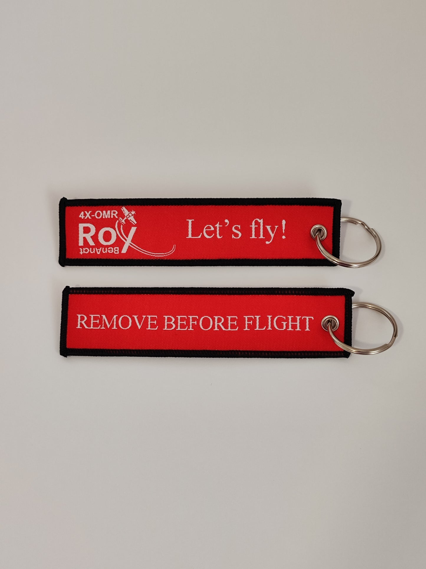 Embroidered 'REMOVE BEFORE FLIGHT' keychain – front side view